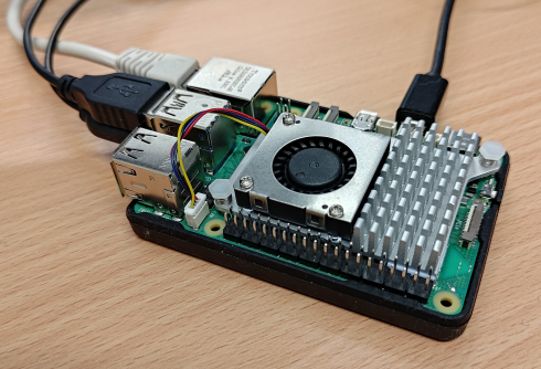 Our Raspberry Pi 5, with bumper case and active cooler.